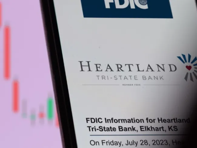 heartland tri-state bank article on cell phone